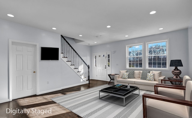 living room with dark hardwood / wood-style floors