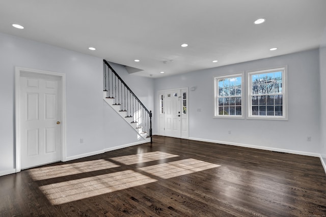 foyer with dark wood-type flooring