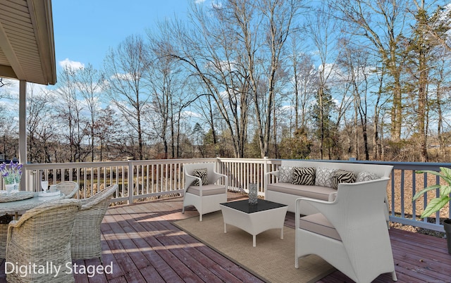 wooden terrace featuring outdoor lounge area