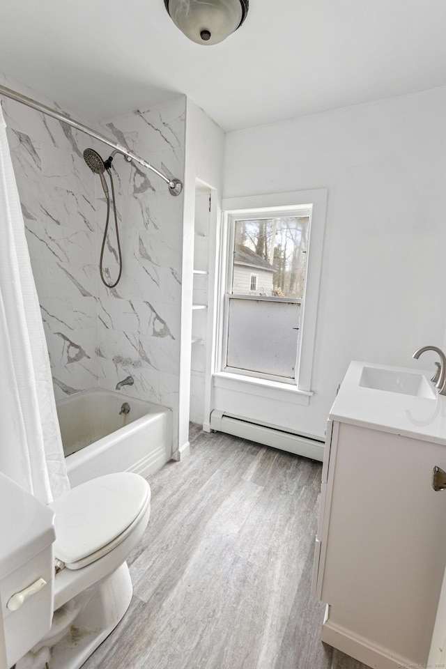 full bathroom with baseboard heating, wood-type flooring, shower / bath combination with curtain, toilet, and vanity