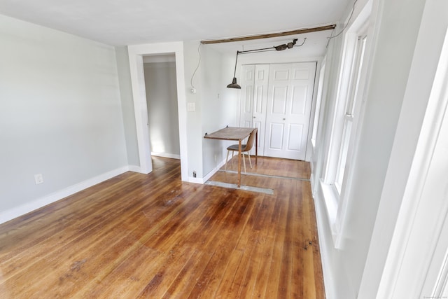 empty room featuring dark hardwood / wood-style floors