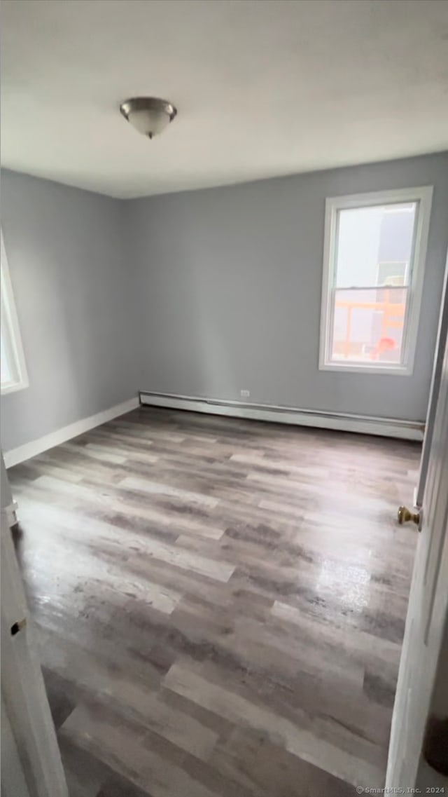 empty room featuring hardwood / wood-style flooring