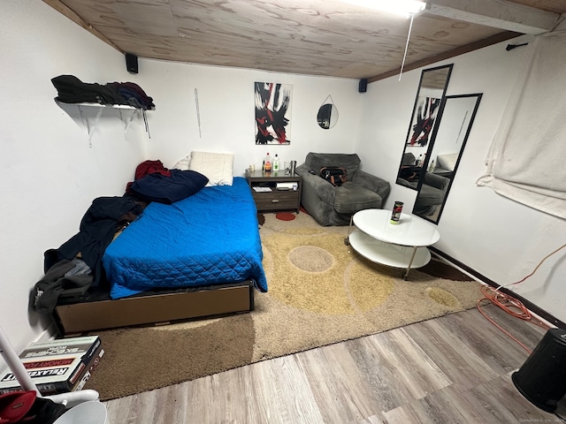 bedroom featuring hardwood / wood-style floors