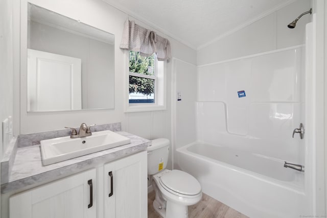 full bathroom with hardwood / wood-style floors, lofted ceiling, crown molding, a textured ceiling, and shower / bath combination