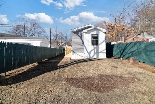 exterior space with a storage shed