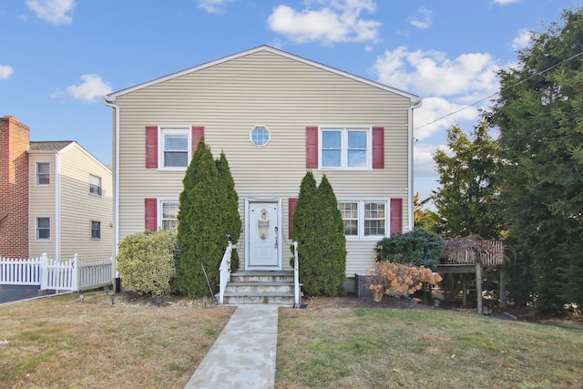 view of front of home with a front yard