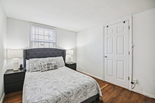 bedroom featuring dark hardwood / wood-style floors