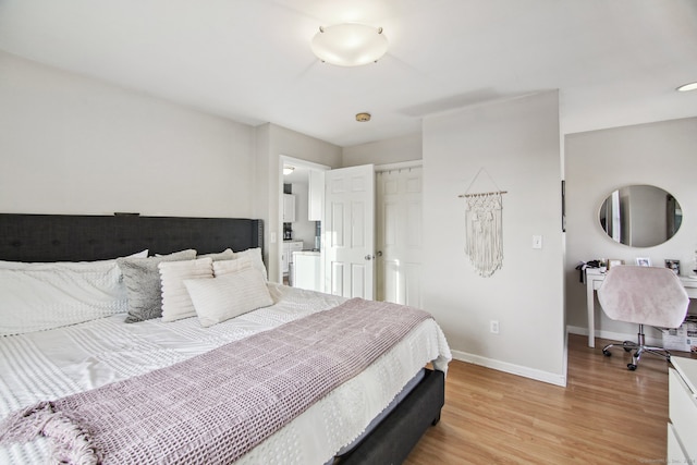 bedroom with light hardwood / wood-style flooring