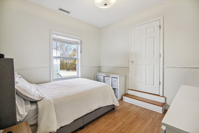 bedroom with light wood-type flooring