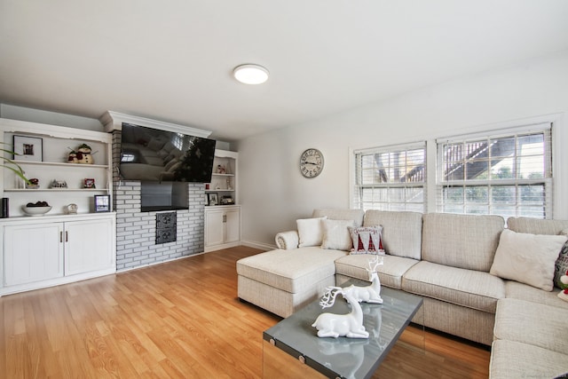 living room with light hardwood / wood-style floors