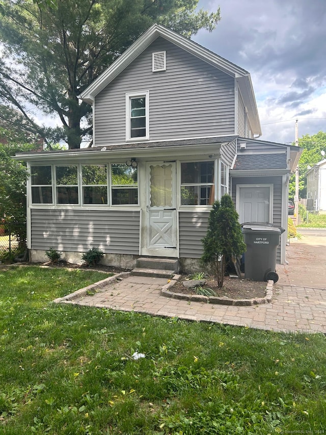 view of front of home with a front yard