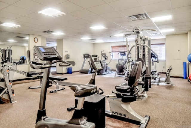 gym featuring a drop ceiling