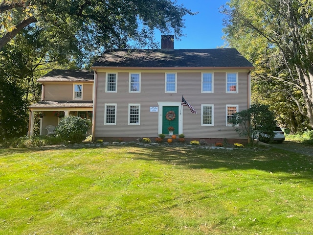 view of front of home with a front lawn