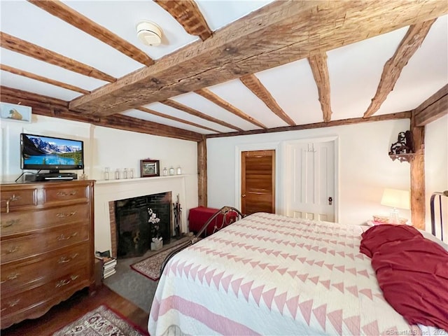 bedroom featuring beam ceiling