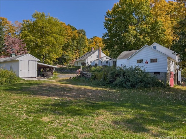 view of yard with a carport