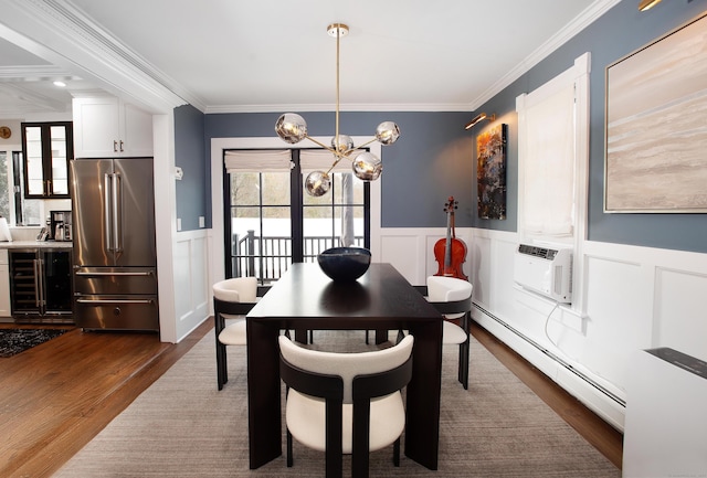 dining room featuring dark wood-type flooring, cooling unit, ornamental molding, baseboard heating, and beverage cooler