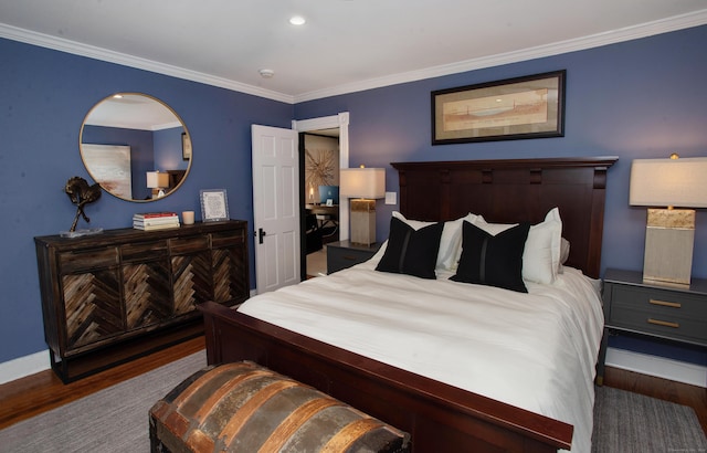 bedroom featuring dark hardwood / wood-style floors and ornamental molding