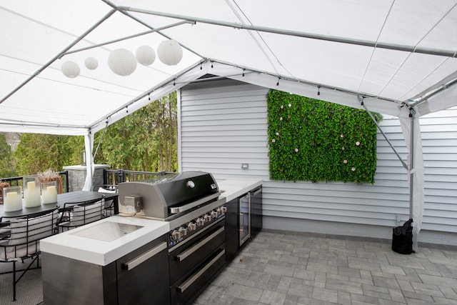 view of patio with exterior kitchen