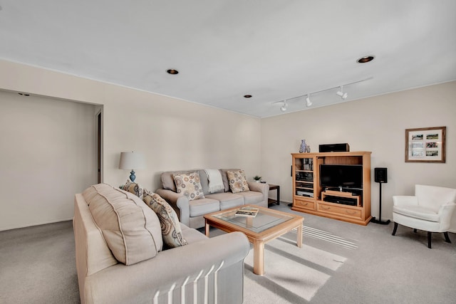 living area with light colored carpet