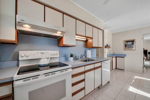 kitchen with light countertops, white cabinetry, a sink, white appliances, and under cabinet range hood