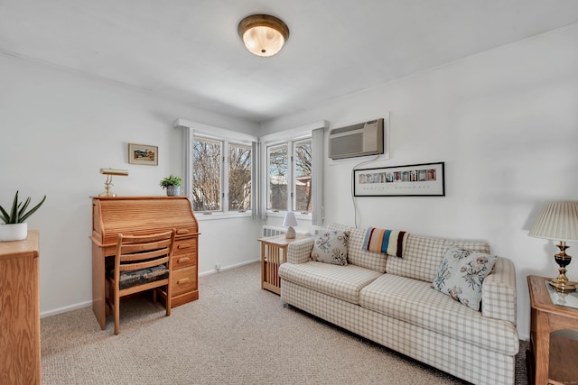 carpeted living area featuring an AC wall unit and baseboards