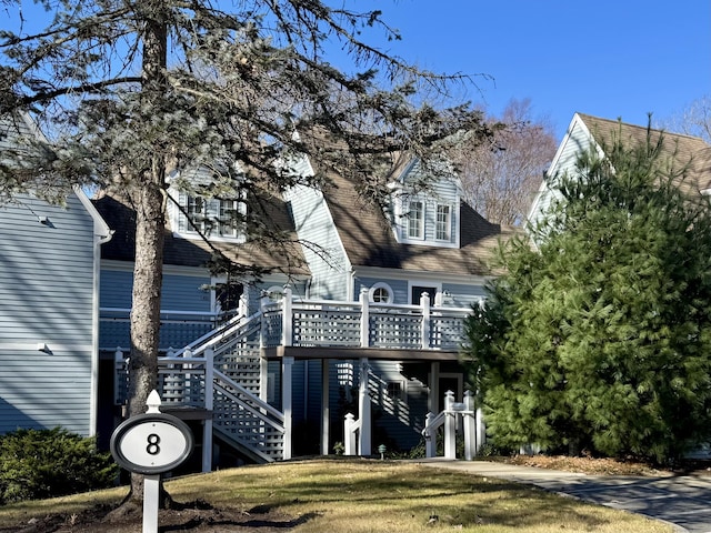 rear view of property with a deck