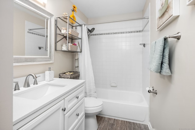 full bathroom featuring toilet, vanity, shower / tub combo with curtain, and hardwood / wood-style flooring