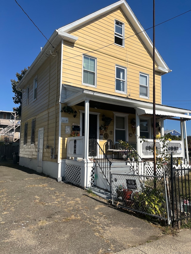 view of front of home featuring covered porch