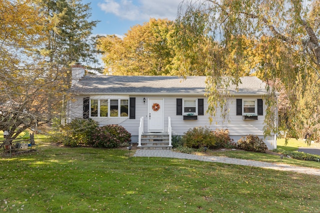 single story home with a front yard