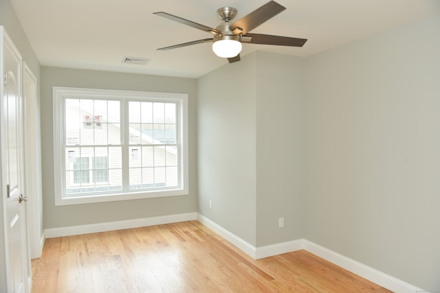 unfurnished room featuring ceiling fan and light hardwood / wood-style floors