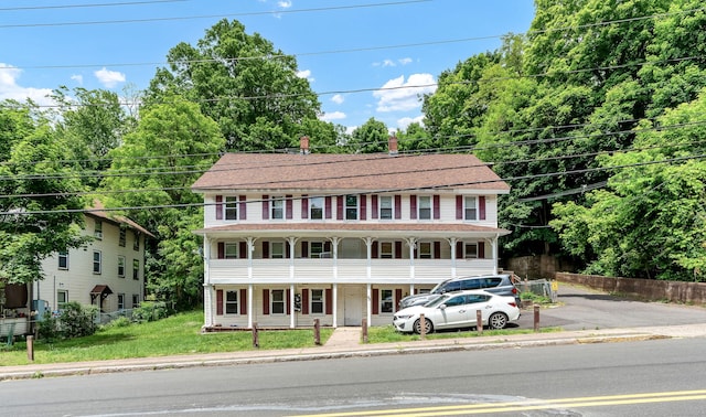 colonial house with a front yard