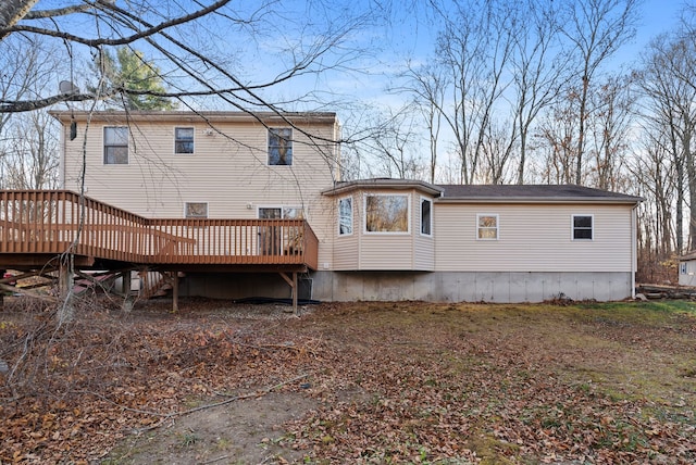 rear view of house with a deck