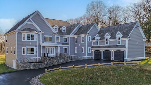 back of house featuring french doors