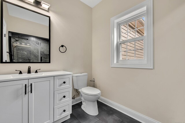 34 Fox Run Rd, Redding, CT 06896 - full bath featuring toilet, a stall shower, baseboards, vanity, and tile patterned floors