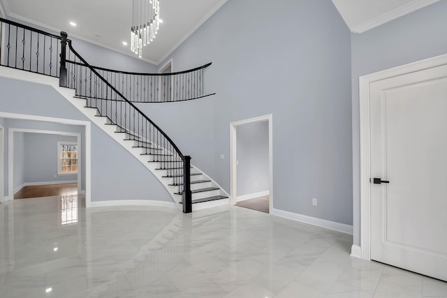 34 Fox Run Rd, Redding, CT 06896 - stairs with ornamental molding, marble tiled flooring, a high ceiling, baseboards, and recessed lighting