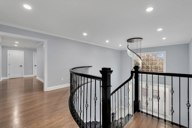 hall featuring crown molding and wood-type flooring