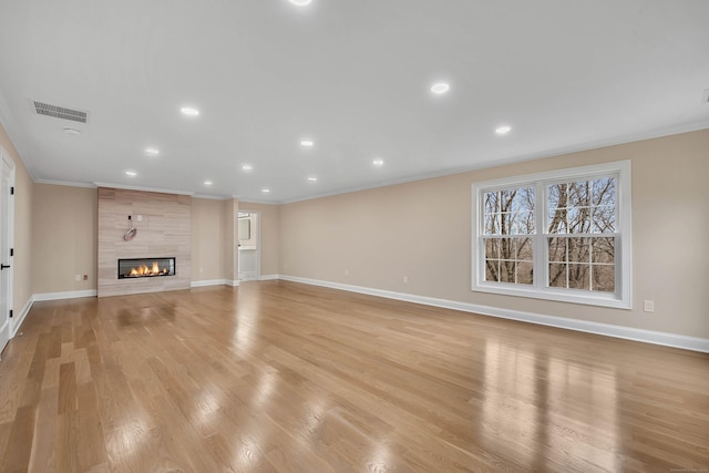 34 Fox Run Rd, Redding, CT 06896 - unfurnished living room featuring baseboards, crown molding, light wood finished floors, a fireplace, and recessed lighting