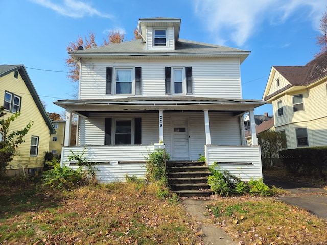 view of front of house featuring covered porch