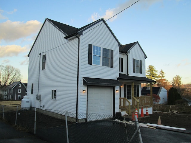 view of property featuring a garage