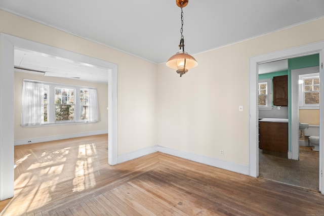 unfurnished room featuring wood-type flooring