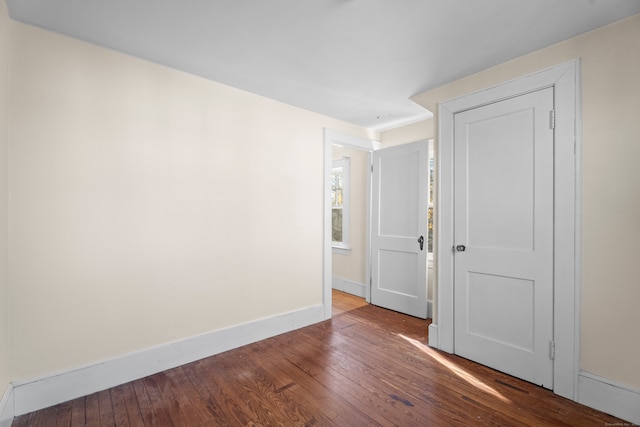 empty room featuring hardwood / wood-style flooring