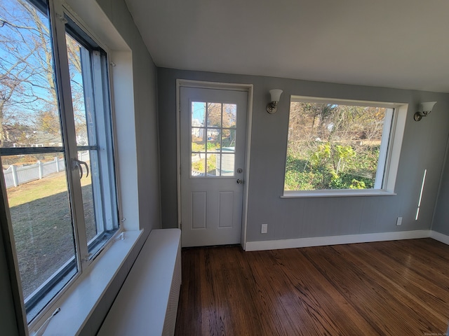 doorway featuring dark hardwood / wood-style floors