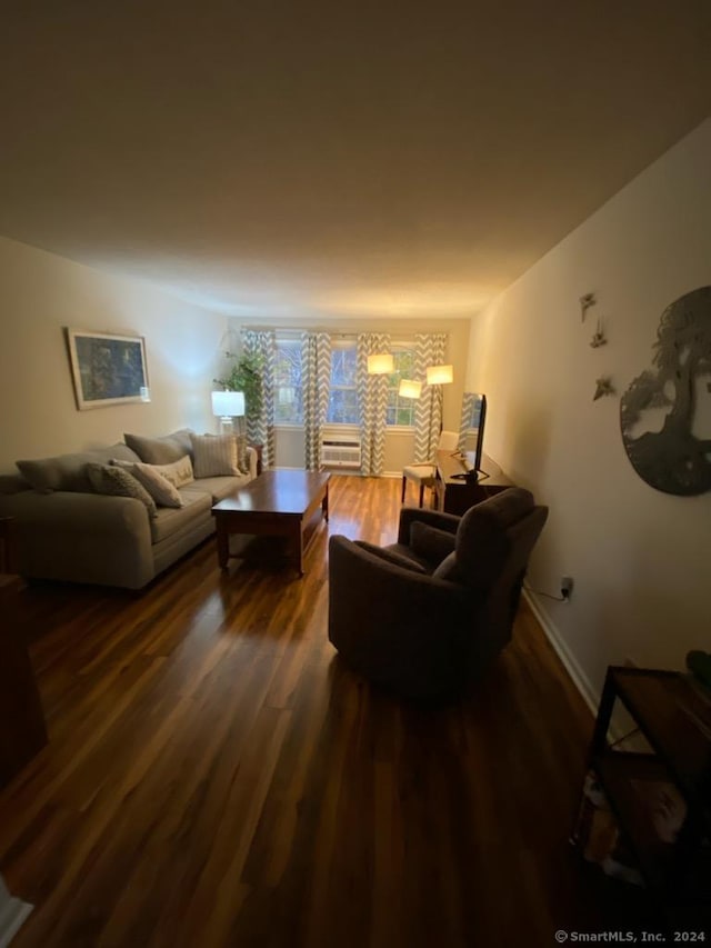 living room featuring dark hardwood / wood-style floors