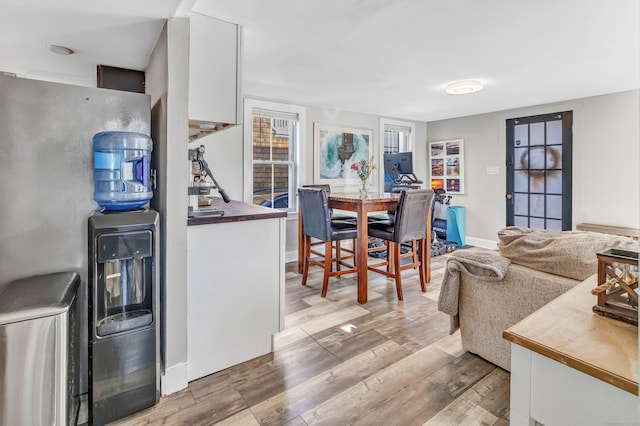 dining area featuring wood-type flooring