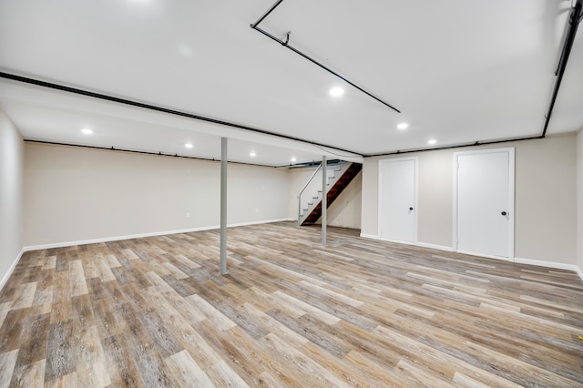 basement with light wood-type flooring