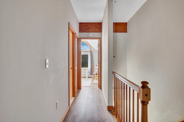 corridor featuring light hardwood / wood-style flooring