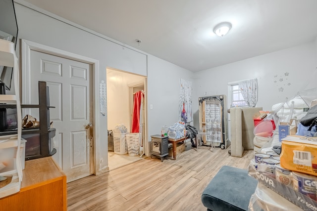 bedroom with light hardwood / wood-style flooring