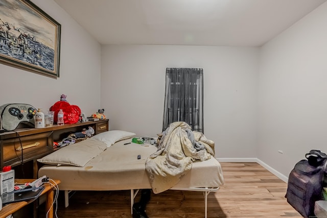 6 Grove Ct, Waterbury, CT 06710 - bedroom with light wood finished floors and baseboards
