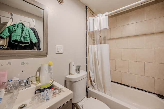 full bathroom featuring shower / bath combo, toilet, and sink