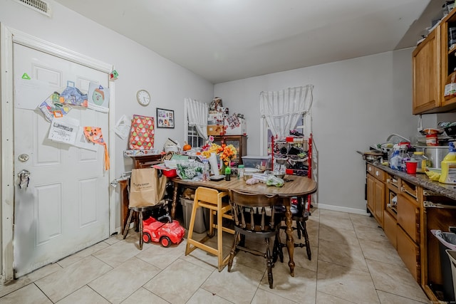 6 Grove Ct, Waterbury, CT 06710 - dining space featuring light tile patterned floors